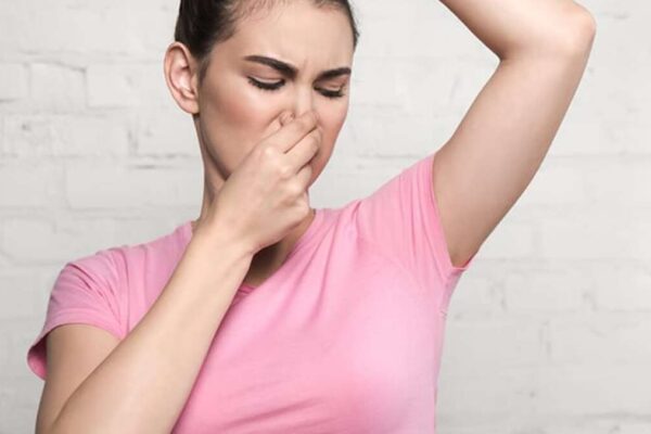 How To Get Sweat Smell Out Of Clothes (Step-by-Step)