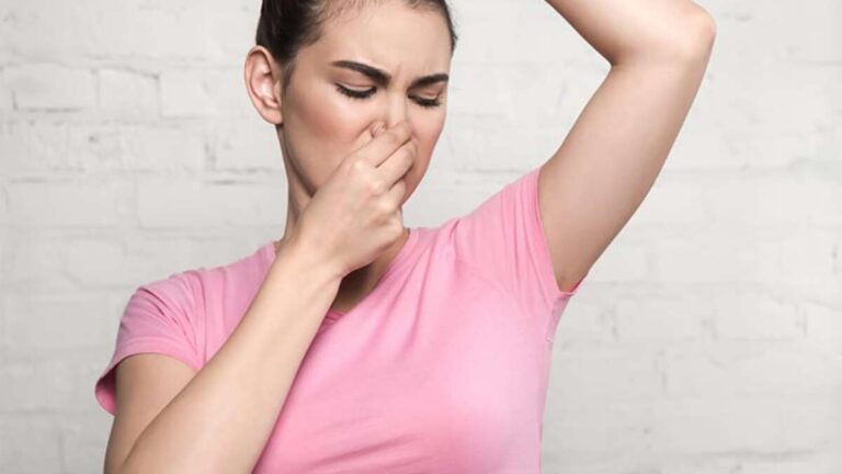 how to get sweat smell out of clothes